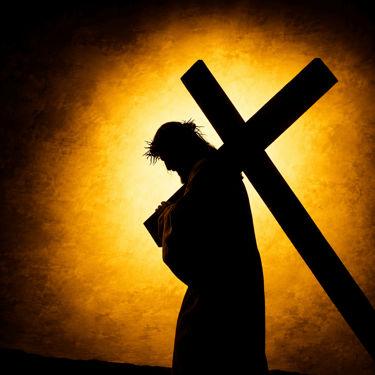 Silhouette of Jesus Christ carrying the Holy Cross against a radiant golden background, symbolizing sacrifice, redemption, faith, hope, and salvation.